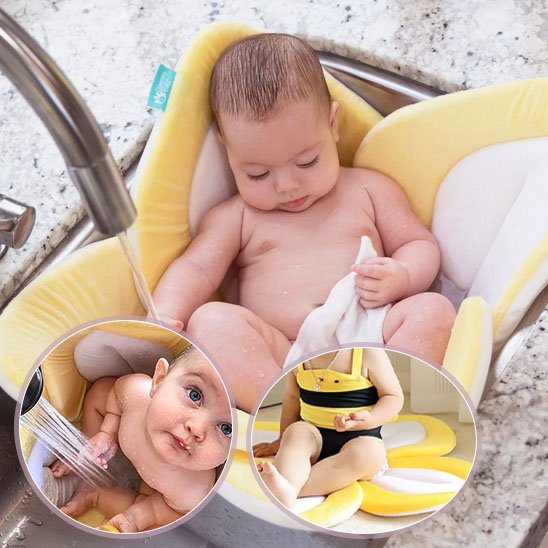 ange qui regarde haut assis dans siege de bain pour bebe siegedoux