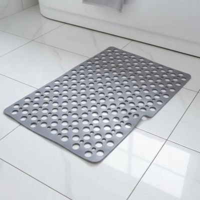 Tapis de bain antidérapant gris avec gros troues près douche ultra adhérant 